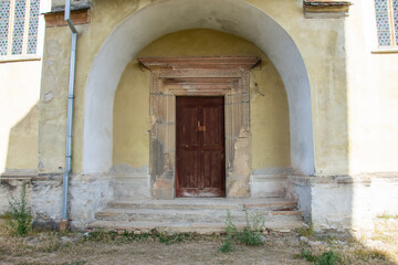 Fototapeta na wymiar Fortified church in Biertan, Sibiu, Romania, September 2020, the old entrance to the Tower