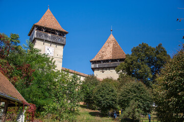 Fototapeta na wymiar Fortified church from Alma Vii village, Moșna commune, Sibiu county, September 2020,The clock tower
