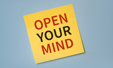 Text open your mind on the short note texture background