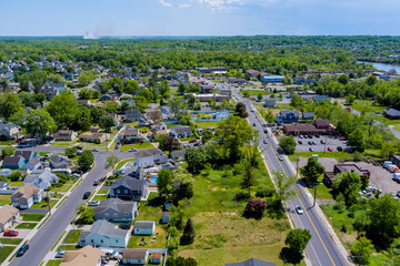 Panoramic view of view at height roofs small town of house of residential quarters Sayreville town NJ US