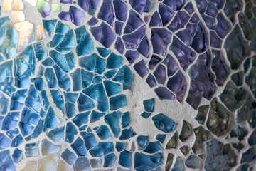 Macro abstract art texture background of a random mosaic pattern of colored glass pieces set in...
