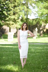 Beautiful young girl posing in the old town