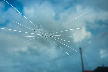 crack in the windshield of the car