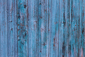 Old wooden blue vertical planks. Front view with copy space. Background for design.