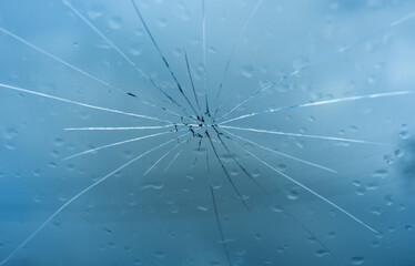 crack in the windshield of the car