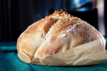 Crispy just baked Sourdough bread loaf resting after just being baked in oven