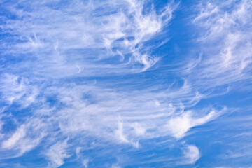 Cirrostratus clouds in the blue sky