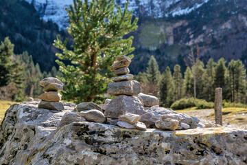 Stone pyramid on the big stone Gavarnie circus France autumn