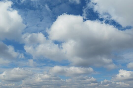 Beautiful blue sky with big fluffy clouds