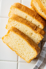 Sliced sponge dessert. Sweet sponge cake