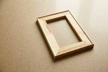 Stretcher bar on table. Wooden frame