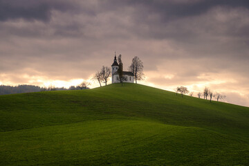 Fototapeta premium Mystic Saint Thomas Church in clouds