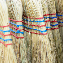 Floor brooms made of twigs.