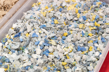Fractions of recyclable materials after recycling. Pulverized materials before reuse in factories.