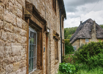 Fototapeta na wymiar beautiful old thatched houses, rural landscape