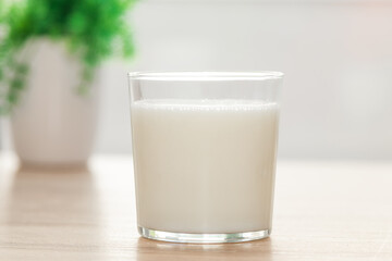 glass of natural milk on the table