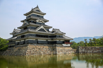 Matsumoto Castle, known as The Crow Castle surrounded by a water moat, Matsumoto, Japan.