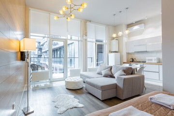 Interior photography luxury kitchen studio in loft style room in white, with kitchen furniture luxury
