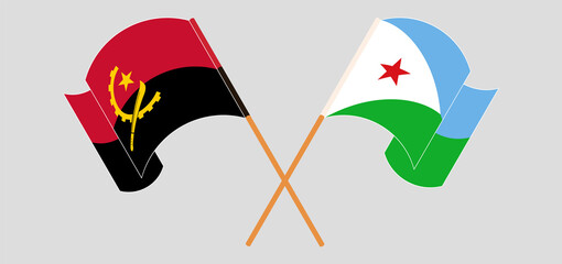 Crossed and waving flags of Angola and Djibouti
