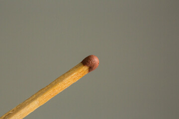 Box of matches on gray background.Matches in the hand.