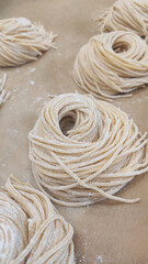 close up of a string of pasta. Flat lay top-down