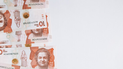 colombian money, ten thousand pesos on white background
