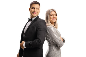 Elegant man and woman posing back to back