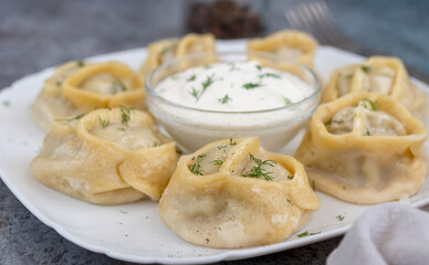 Asian dish manti stuffed with meat, steamed