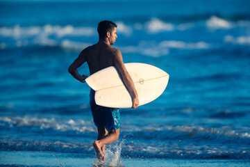 Man with surfboard