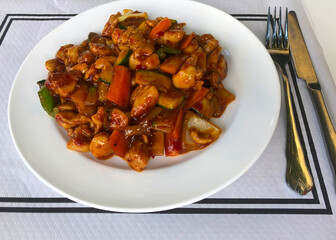 Typical recipe of Chinese gastronomy: beef with vegetables and spicy sauce