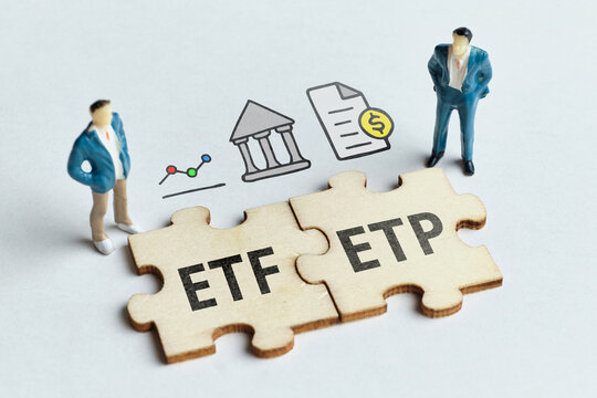 exchange-traded product ETP and exchange-traded fund ETF on a connected puzzle with businessmen
