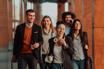 Business colleagues walking and talking on city streets