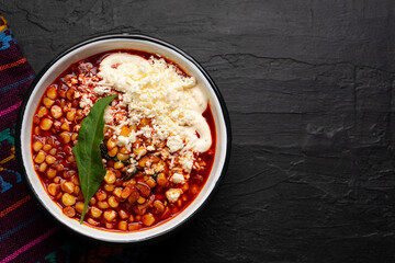 Red corn esquites on dark background. Mexican food