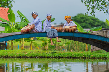 muslim boys resting after ramadan festival celebration with musilm rabana drum