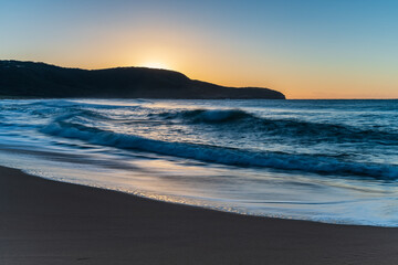 Obraz premium Sunrise at the seaside with clear skies