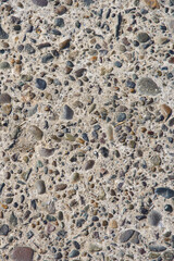 Cement texture with pebbles. Gray color, cement. Background for designs