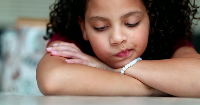 Pensive girl, preteen thoughtful contemplative kid thinking about solution