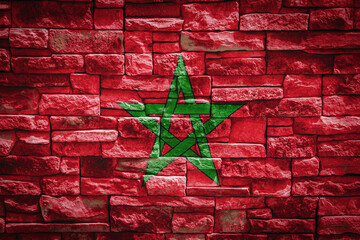 National flag of Morocco on stone  wall background.The concept of national pride and symbol of the...