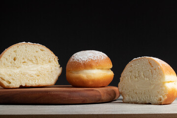 Brazilian Sonho or Berlin balls. Two halves and one mini Berlin ball.