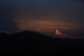 time clouds over the mountains