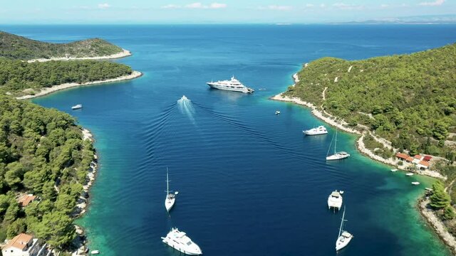 Stoncica Beach At Summer - Sailboat, Catamaran, And Yachts On A Narrow Bay With Blue Water In Vis Island, Croatia. - aerial