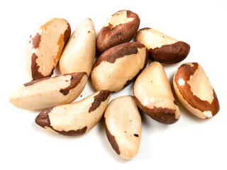 several shelled brazil nuts closeup on white