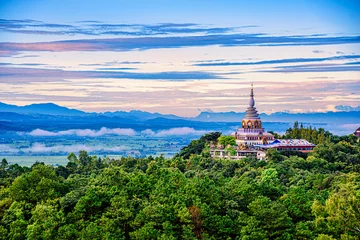 Fotobehang Beautiful pagoda of Tha Ton Temple set amid green mountains in Chiang Mai,Thailand. © nuwatphoto