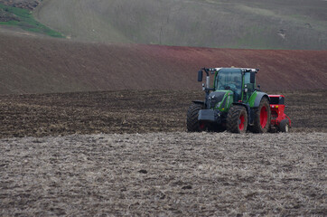  A tractor works the fields before sowing in the countryside of lower Molise