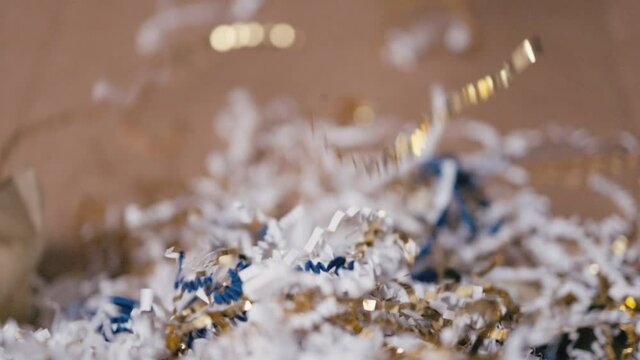 Colorful confetti falling. Holiday or Christmas theme or background.