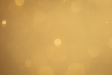 Dark Abstract Gold bokeh sparkle on black background