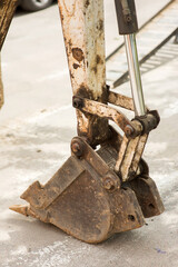 Backhoe for Mini excavator on the construction site, close-up