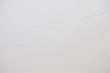 Crack on the white wall.