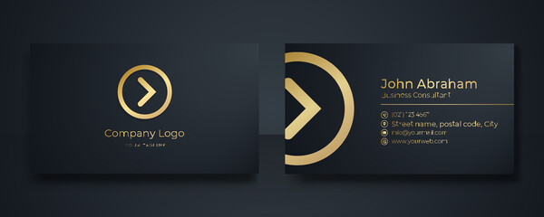 Modern Business Card - Creative and Clean Business Card Template. Luxury business card design template. Elegant dark back background with abstract golden wavy lines shiny. Vector illustration