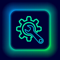 Glowing neon line Wrench and gear icon isolated on black background. Adjusting, service, setting, maintenance, repair, fixing. Colorful outline concept. Vector